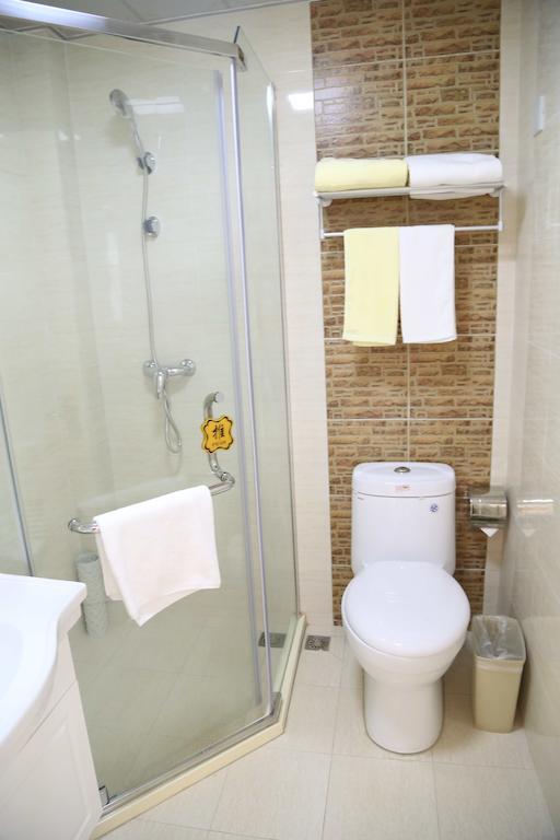 Qingdao Fu Yong Hotel Habitación foto