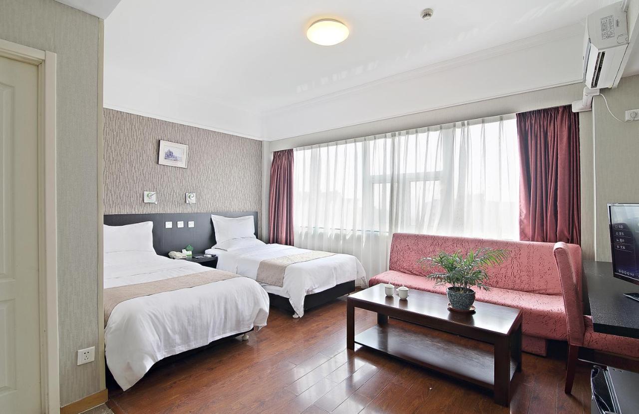 Qingdao Fu Yong Hotel Habitación foto